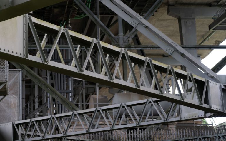 Steel beam structures supporting bridge